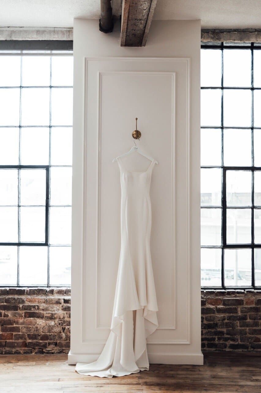 Wedding dress hanging in Terminus 330 bridal suite