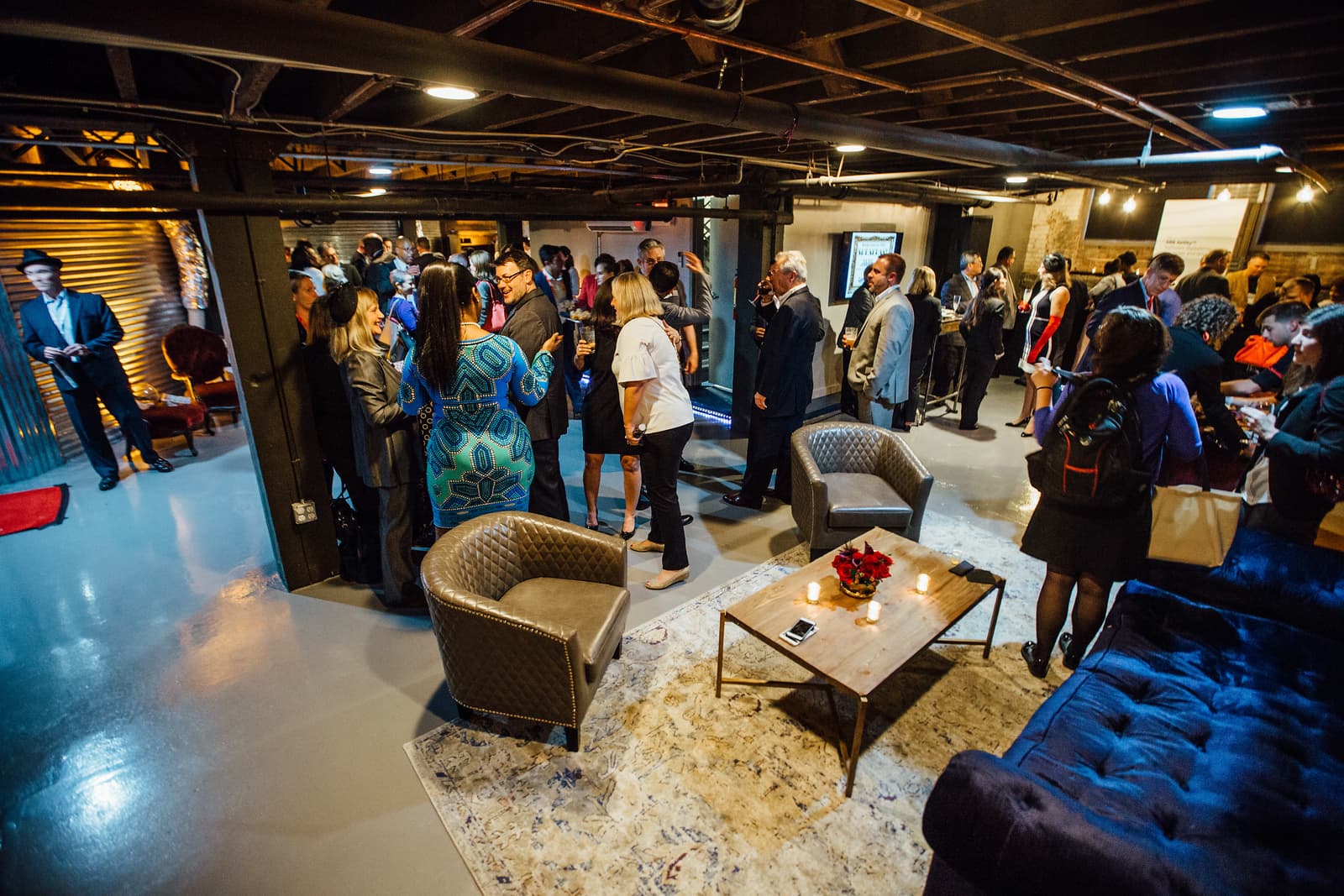 People laughing at an event in the Cellar