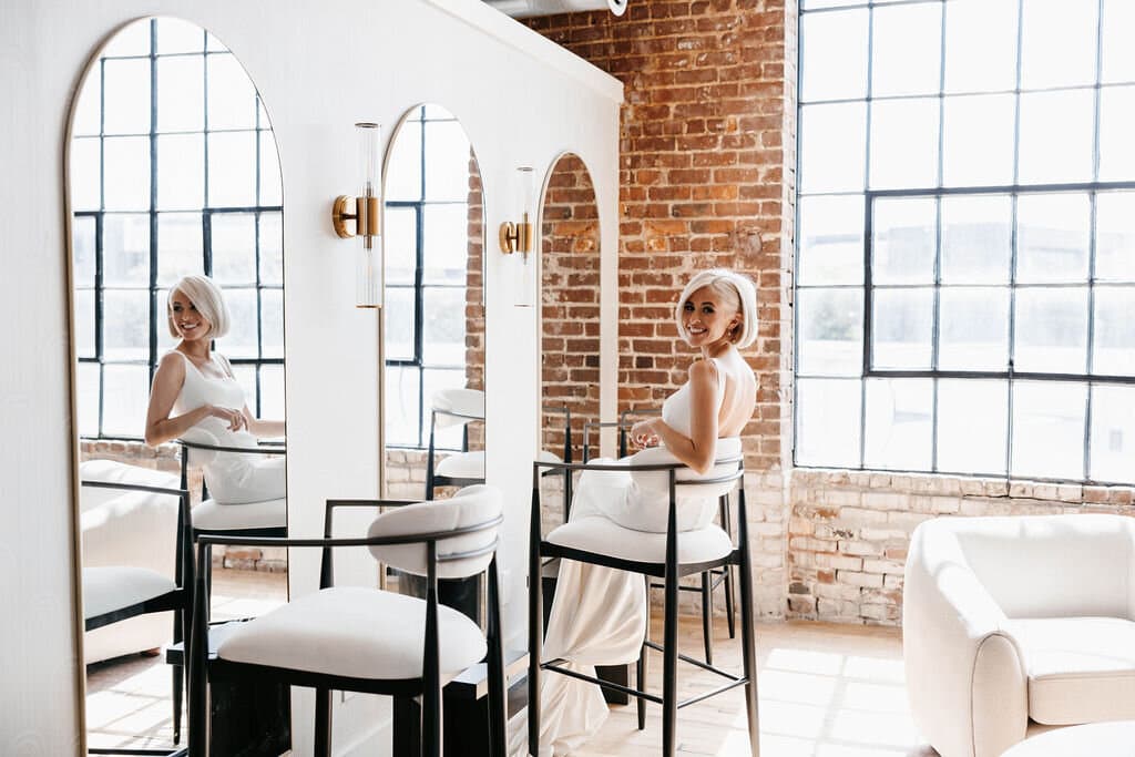 Bride in front of mirror