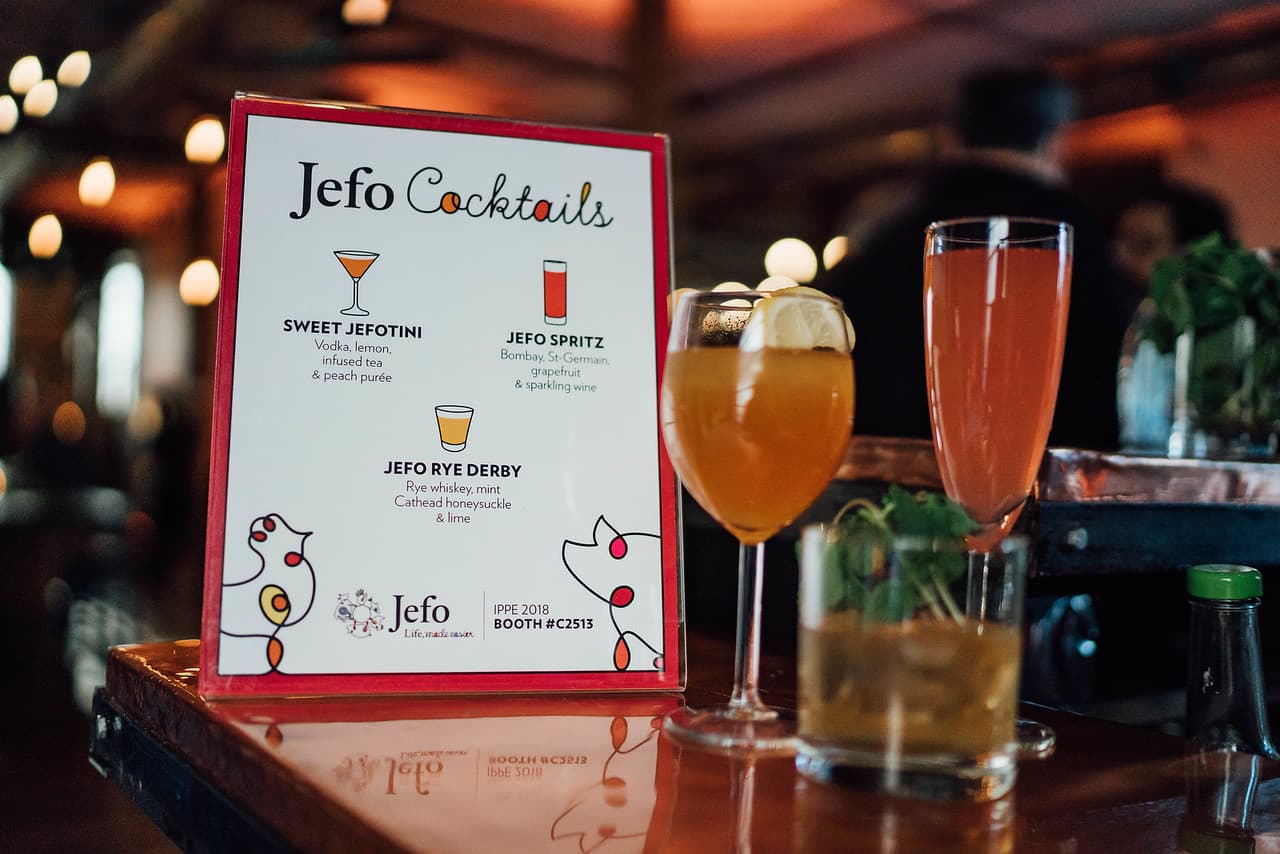 Signature drink menu and cocktails on the bar